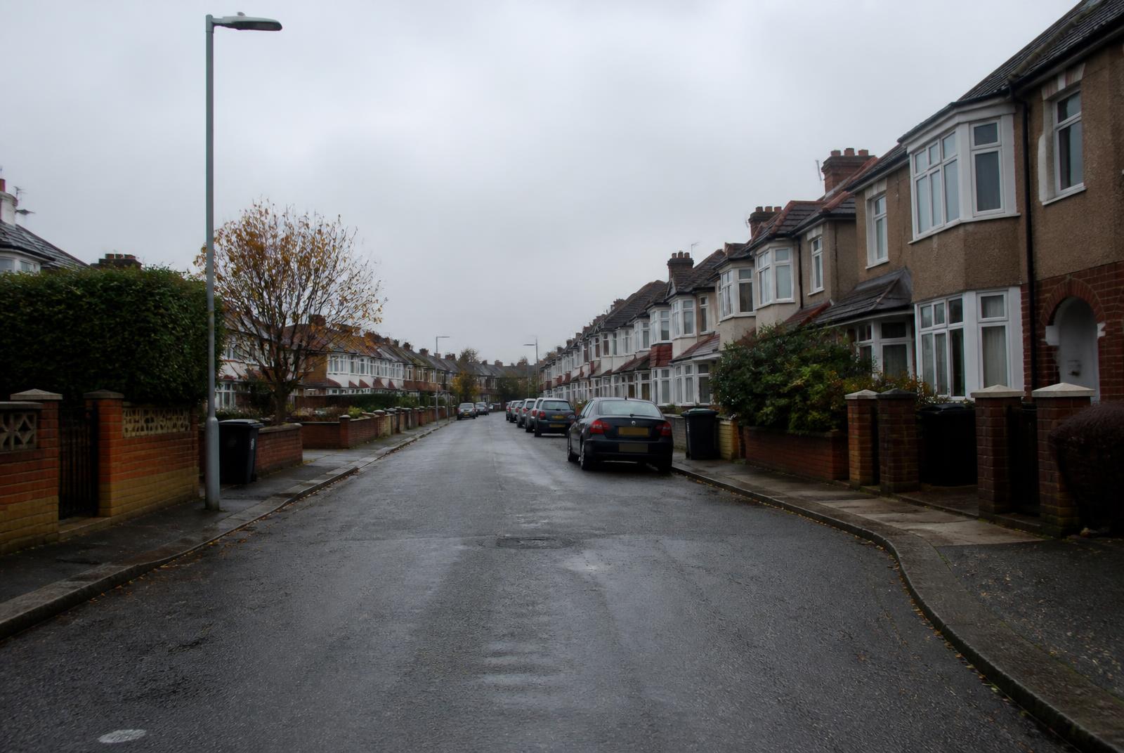 Suburban street of 1930s semi-detached houses in the North West of England